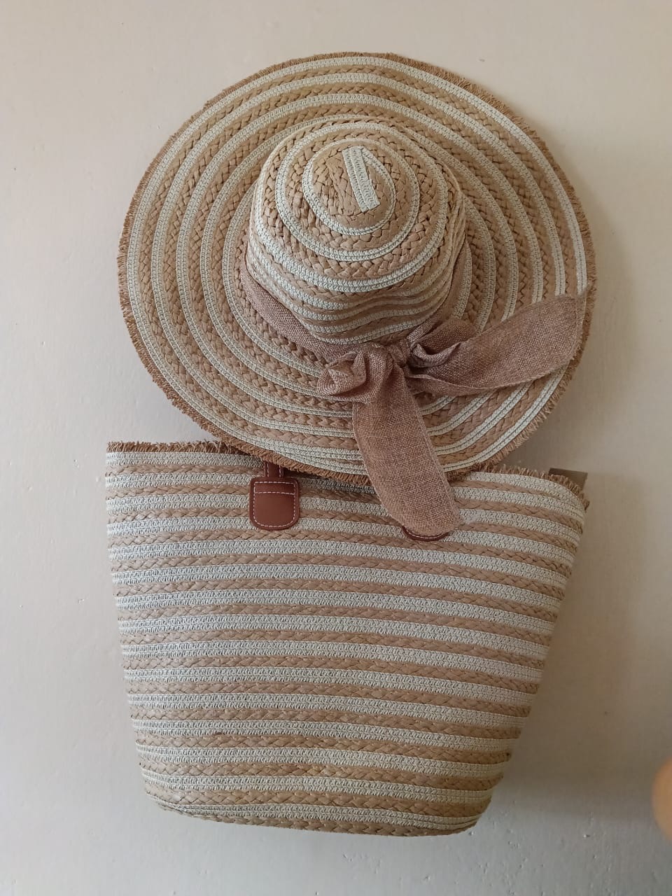 Natural Striped Hat & Tote Set — A coordinated natural striped wide-brim hat with a soft bow and a matching structured tote.