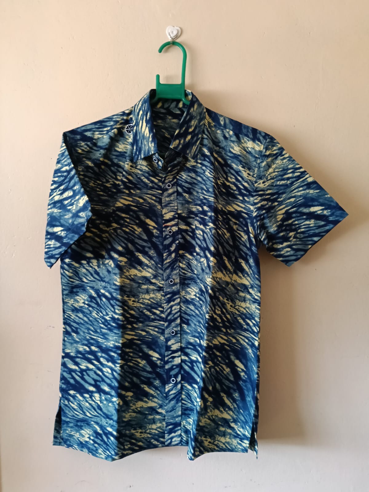 Indigo Resist-Print Short-Sleeve Shirt — A collared short-sleeve shirt in an indigo and natural resist-style print with a clean button front.